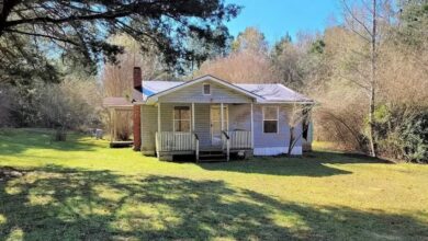 Photo of 6 acres with a fixer-upper retreat home. $59,700
