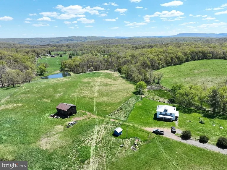 22 acres, ponds, wildlife, farming & six bedroom farmhouse. $215,000