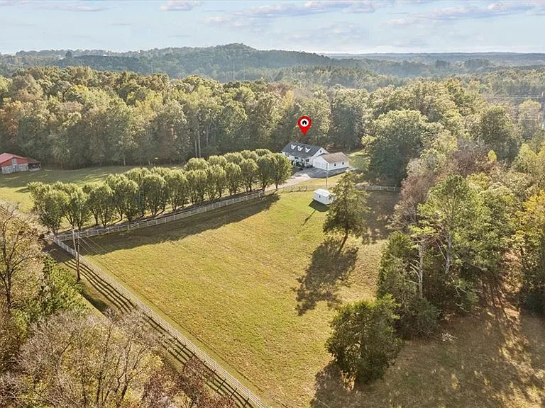 Serene 3-Bedroom Ranch Home on 22 Acres with Private Pond